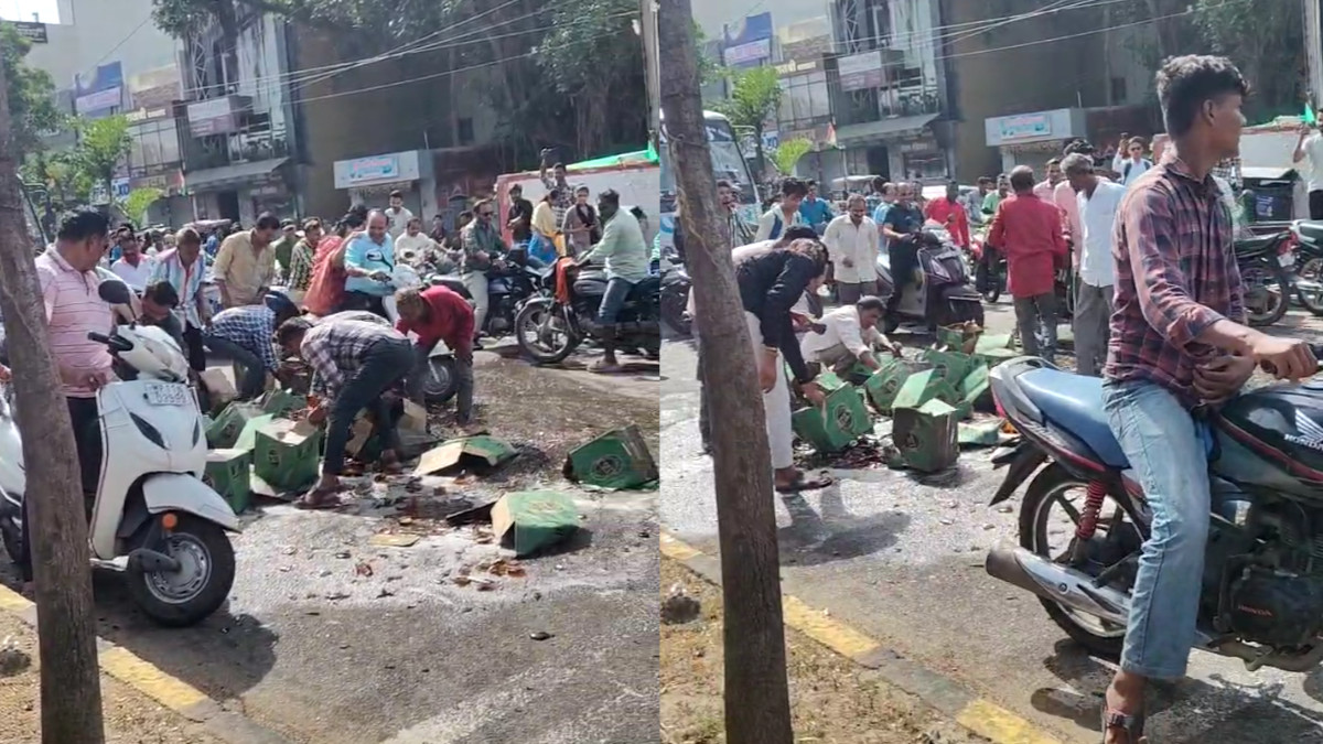 Dhar: Liquor Cartons Scattered on Road, People Loot Bottles Extensively — Video Goes Viral